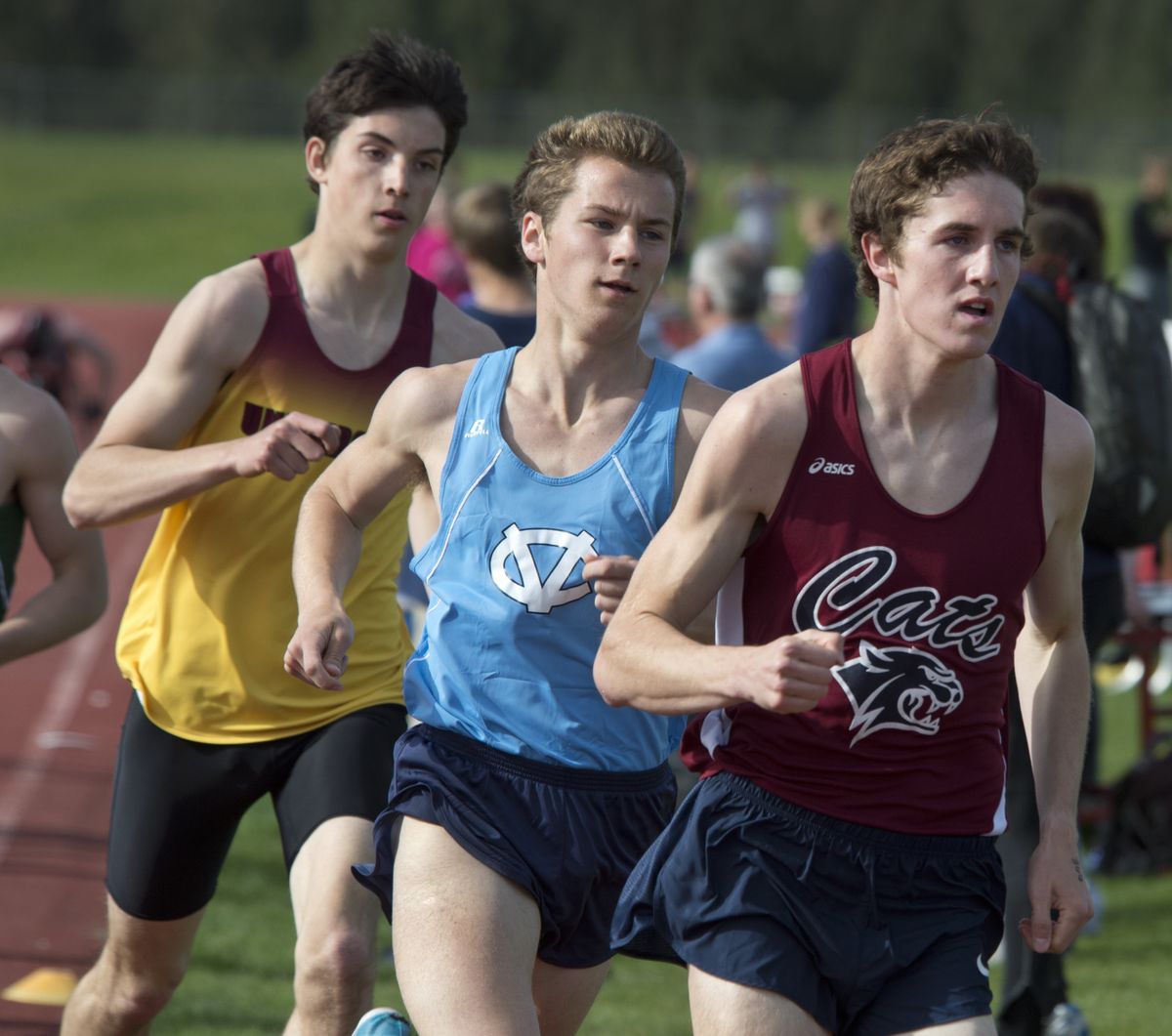 Mt. Spokane’s Johnny Dressel sets the pace for CV’s Briton Demars and U-Hi’s Isaac Barville in the boys 1600 race May 8 at Mt. Spokane High School. (Dan Pelle)