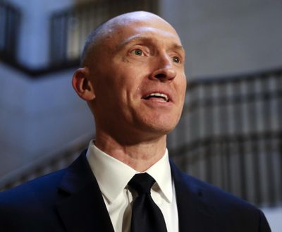 Carter Page, a foreign policy adviser to Donald Trump's 2016 presidential campaign, speaks with reporters Nov. 2, 2017 following a day of questions from the House Intelligence Committee on Capitol Hill in Washington. (J. Scott Applewhite / Associated Press)