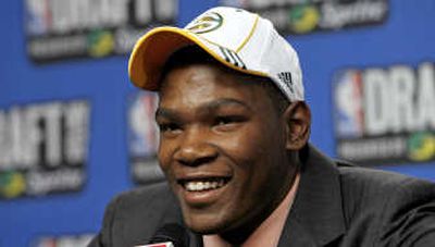 Kevin Durant tells the press Thursday he is ready to look for a place to live now that he knows where he is headed – Seattle. Associated Press
(Associated Press / The Spokesman-Review)