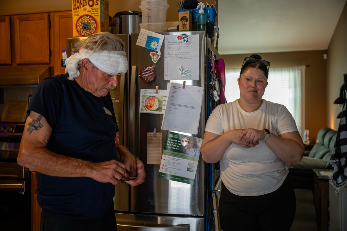 Rebecca Hill, who says her disability should exempt her from work requirements for SNAP, works with her father to sell items in storage in an effort to make ends meet.  (Ash Ponders/For The Washington Post)