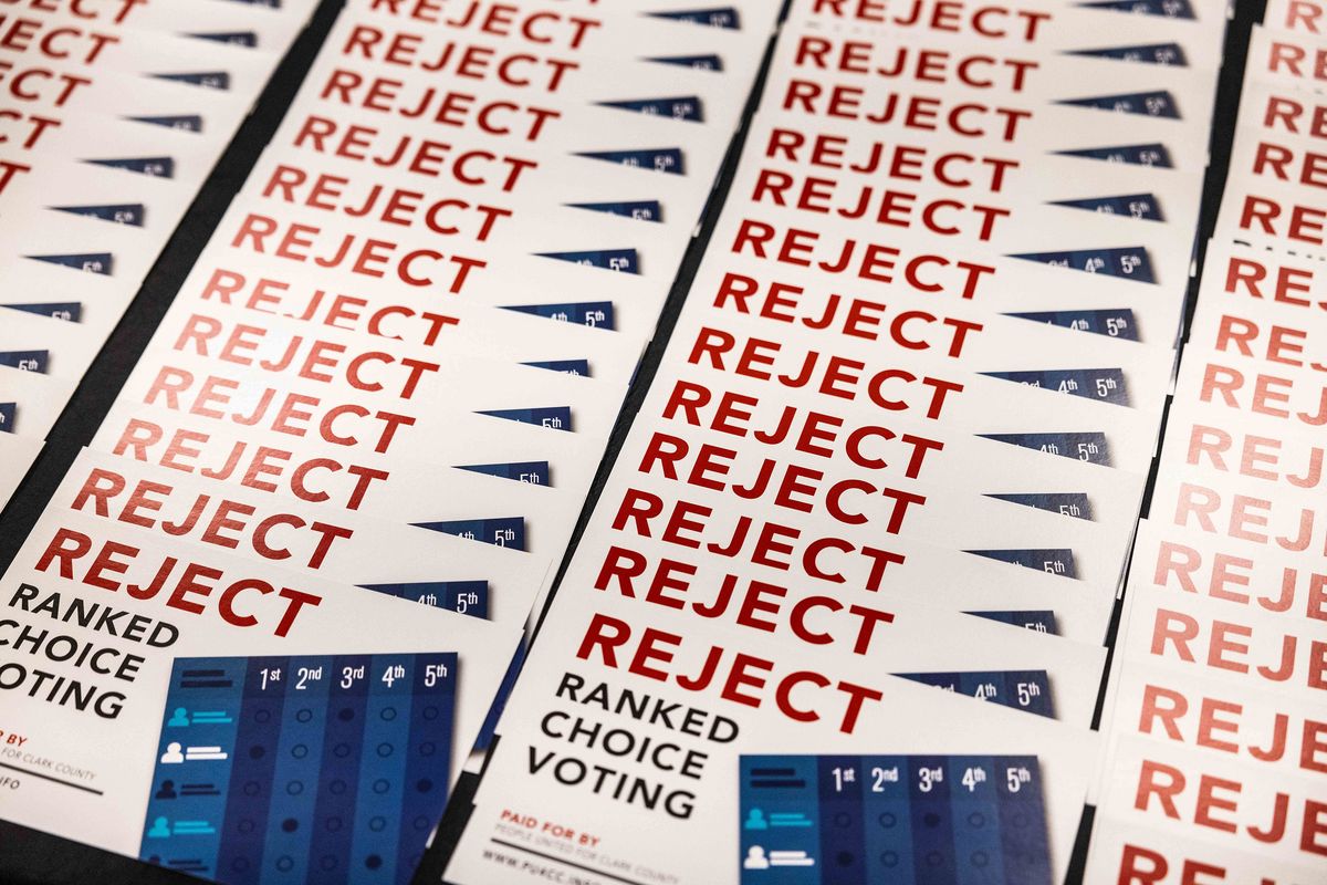 Flyers detailing the rejection of ranked choice voting sits on a table at the RV Inn Style Resort Convention Center on Sept. 8, 2022.    (Daniel Kim/The Seattle Times/TNS)