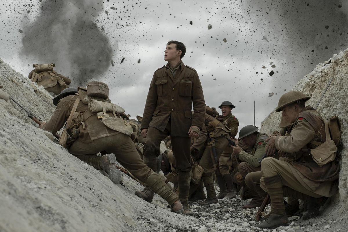 This image released by Universal Pictures shows George MacKay, center, in a scene from "1917," directed by Sam Mendes. On Monday, Jan. 13, the film was nominated for an Oscar for best picture. (François Duhamel/Universal Pictures via AP) ORG XMIT: NYET701 (François Duhamel / AP)