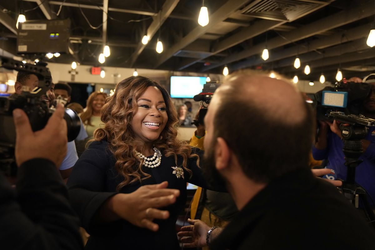 Democrat Sheila Cherfilus-McCormick greets supporters as she arrives at an election night party, Tuesday, Jan. 11, 2022, in Fort Lauderdale, Fla. Cherfilus-McCormick, a health care company CEO, defeated Republican Jason Mariner in the special election to fill Florida