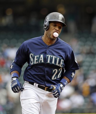 Robinson Cano had a healthy and extremely productive 2016 season the for Mariners, his third in Seattle. (Elaine Thompson / Associated Press)
