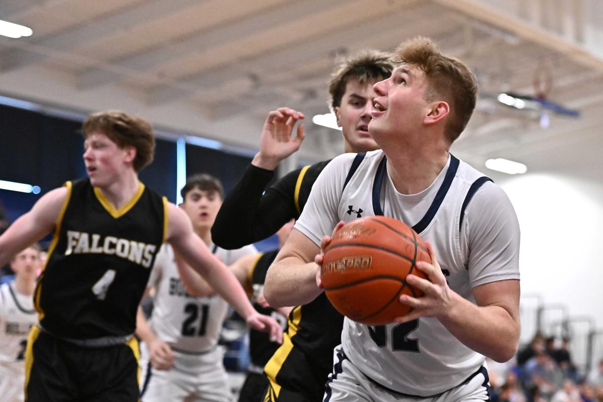 Gonzaga Prep Bullpups Dylynn Groves (32) shoots the ball against Hanford Falcons Dalton Jenkin (24) in the first half of a District 6 4A first-round game on Saturday, Feb. 14, 2026, at the Scarpelli Gym in Spokane WA.  (James Snook)