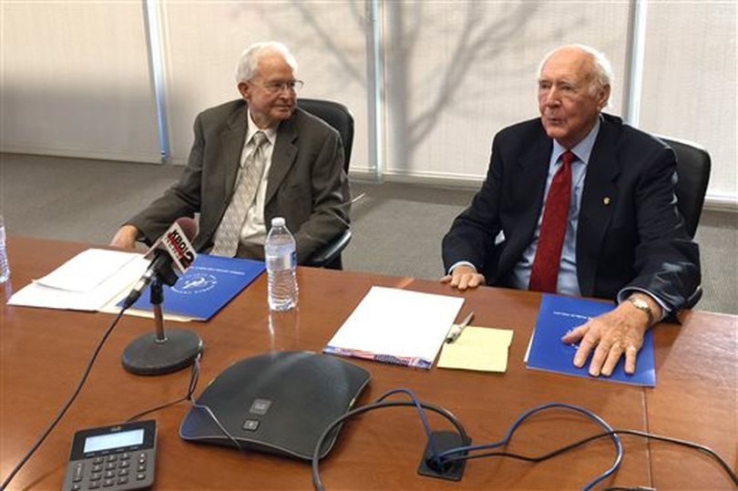 Former Idaho Governors Cecil Andrus, right, and Phil Batt, left, talk to reporters, Thursday, Jan. 15, 2015 in Boise (AP)