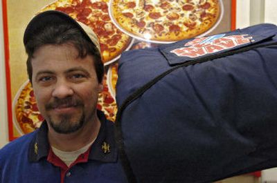 
Domino's pizza delivery driver Jim Pohle works in Pensacola, Fla. He represents 11 drivers in a union.
 (Associated Press / The Spokesman-Review)