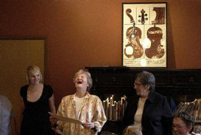 
Sister Karen Conlin, center, reacts with delight after friends and family surprised her with a new studio at Holy Names Music Academy. 
 (Brian Plonka / The Spokesman-Review)
