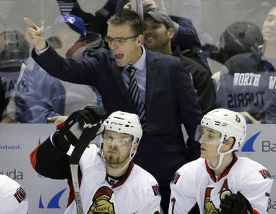 Ottawa Senators head coach Dave Cameron, top, was fired after the team missed the playoffs. (Marcio Jose Sanchez / Associated Press)