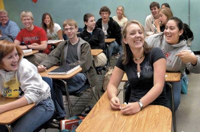 
North Medford High School students Shauna Spano, left, Samantha Heim, center, and Rachel Rodriguez, right, discuss their future plans. 
 (Associated Press / The Spokesman-Review)