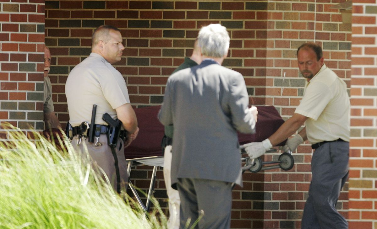 The body of Dr. George Tiller is removed from  Reformation Lutheran Church in Wichita, Kan., on Sunday. Associated Press photos (Associated Press photos / The Spokesman-Review)