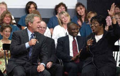 
President Bush discusses health care with Joyce Phifer, right, Tuesday in Youngstown, Ohio. President Bush discusses health care with Joyce Phifer, right, Tuesday in Youngstown, Ohio. 
 (Associated PressAssociated Press / The Spokesman-Review)