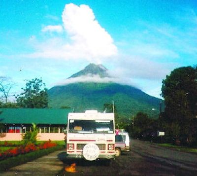 
Jim Jaillet's motor home in La Fontuna, Costa Rica, with the active Arenal Volcano steaming in the background.  
 (Photo courtesy of Jim Jaillet / The Spokesman-Review)