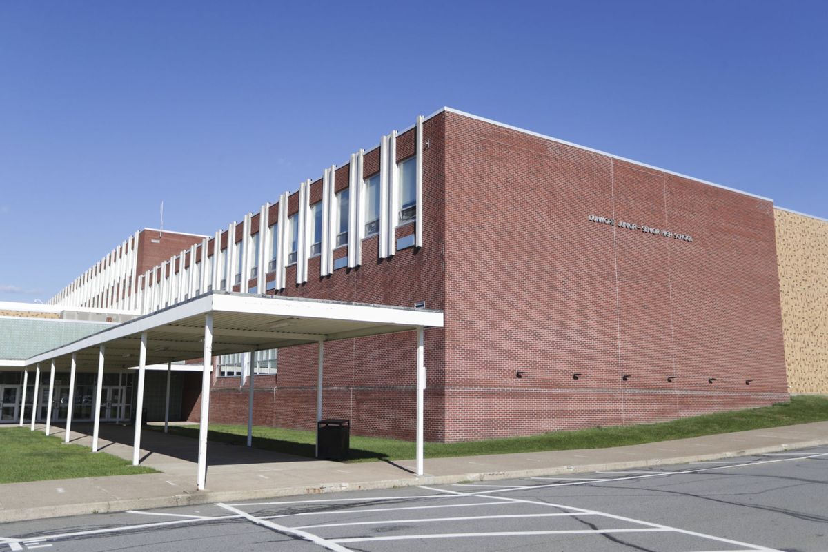 This Sept. 2021 photo shows Dunmore High School in Dunmore, Pa. Four teenagers have been charged with a plot to attack a Pennsylvania high school in 2024, on the 25th anniversary of the massacre at Colorado's Columbine High School, authorities said, Friday, Sept. 24, 2021. A 15-year-old girl and 15-year-old boy are charged as adults and two other teenagers face juvenile charges in the plan to attack Dunmore High School, outside Scranton, on April 20, 2024, authorities said.  (Jake Danna Stevens)