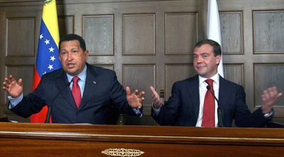 Russian President Dmitry Medvedev, right, and Venezuelan President Hugo Chavez attend a news conference at the Meiendorf Castle residence outside Moscow on Tuesday.  (Associated Press / The Spokesman-Review)