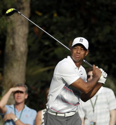 Tiger Woods was all over the course during the first round of the Masters, but his short game held up. (Associated Press)