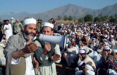 
 In this photo released by the Press Information Department of Northwest Frontier Province, Senior Minister  Siraj ul-Haq, who announced he would resign in protest, addresses a gathering Monday in  the Pakistani tribal area along the Afghan border. 
 (Associated Press / The Spokesman-Review)