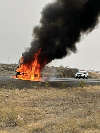 A Washington State Department of Transportation asphalt truck caught fire during a police pursuit Tuesday morning near Ritzville, Wash.  (Courtesy of Adams County Sheriff's Office)