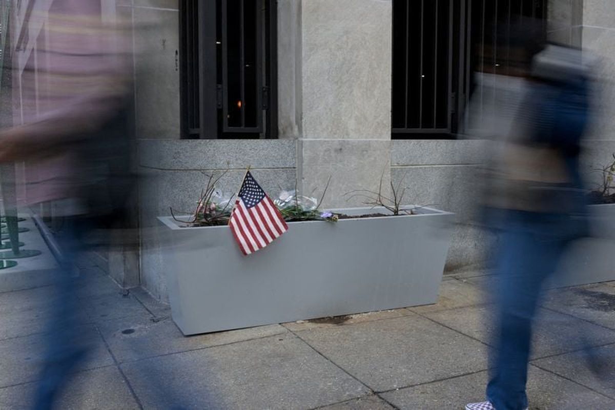 A makeshift memorial is seen outside of the Farragut West Metro Station a day after two National Guard members were shot in Washington, D.C.  (Reuters)