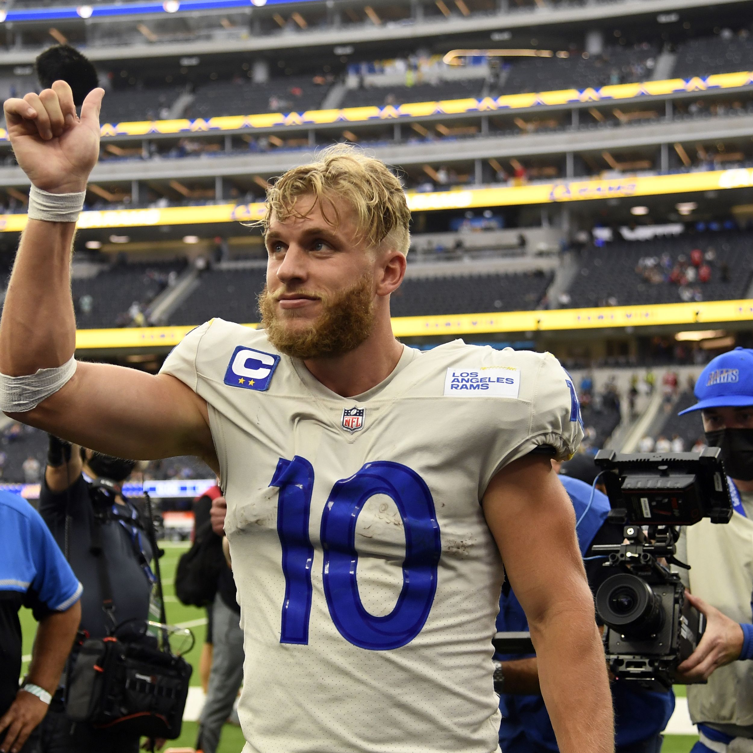 Cooper Kupp signed his extension wearing a Matthew Stafford jersey