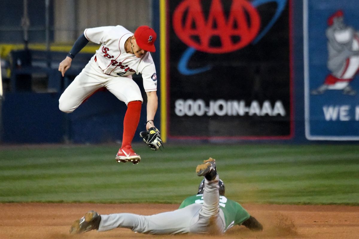 Eugene’s Patrick Bailey steals second base while Spokane Indians shortstop Jack Blomgren takes the throw during Tuesday’s High-A West opener at Avista Stadium.  (Kathy Plonka/The Spokesman-Review)