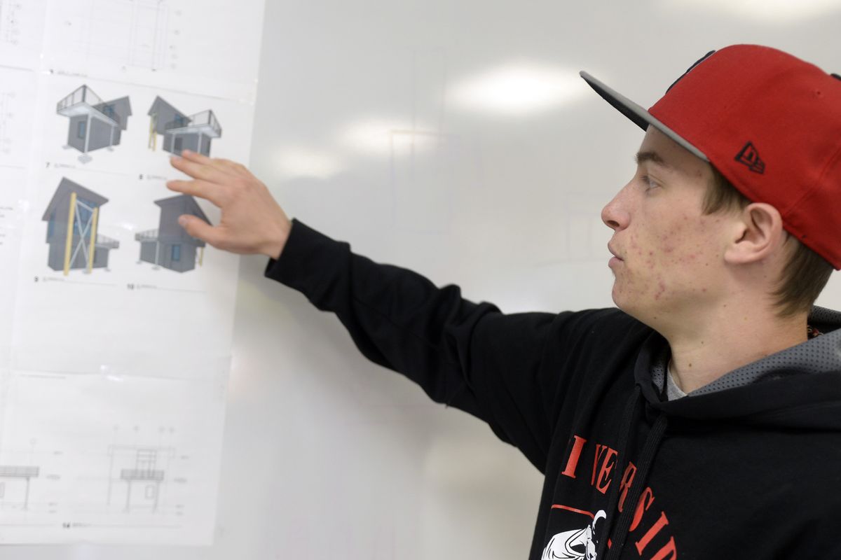 Dallas Shuler, a senior at Riverside High School, talks about the class project of building an environmentally friendly house.