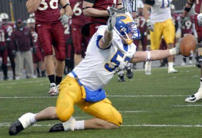 
Delaware's Erik Johnson celebrates as he comes up with an interception. Associated Press
 (Associated Press / The Spokesman-Review)