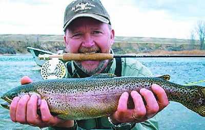 
Randy LaBeff: a quick study on fly fishing, except for the part about posing with the fish.
 (Photo courtesy of Randy LaBeff / The Spokesman-Review)