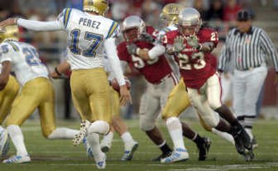 
Washington State's Husain Abdullah (23) partially blocked a UCLA punt during last Saturday's Pac-10  win at Martin Stadium. 
 (Christopher Anderson / The Spokesman-Review)