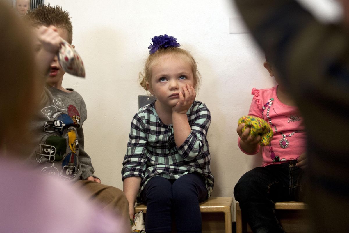 Two-year-old Ellie Sonnemaker was not impressed with the bean bag song at Joya Children & Family Developement in Spokane on Wednesday, April 10, 2019. Joya was formerly the Spokane Guilds