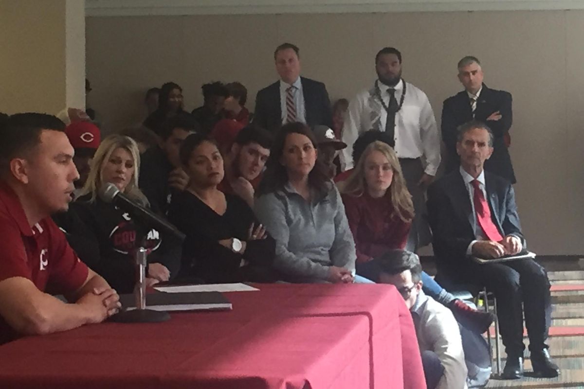 Senator Mike Baumgartner, right, and suspended football player Robert Barber (white shirt and tie) stand in the back as supporters talk to the WSU board of regents on Friday, Nov. 4, 2016 at the Compton Union Building in Pullman. (Jacob Thorpe / The Spokesman-Review)