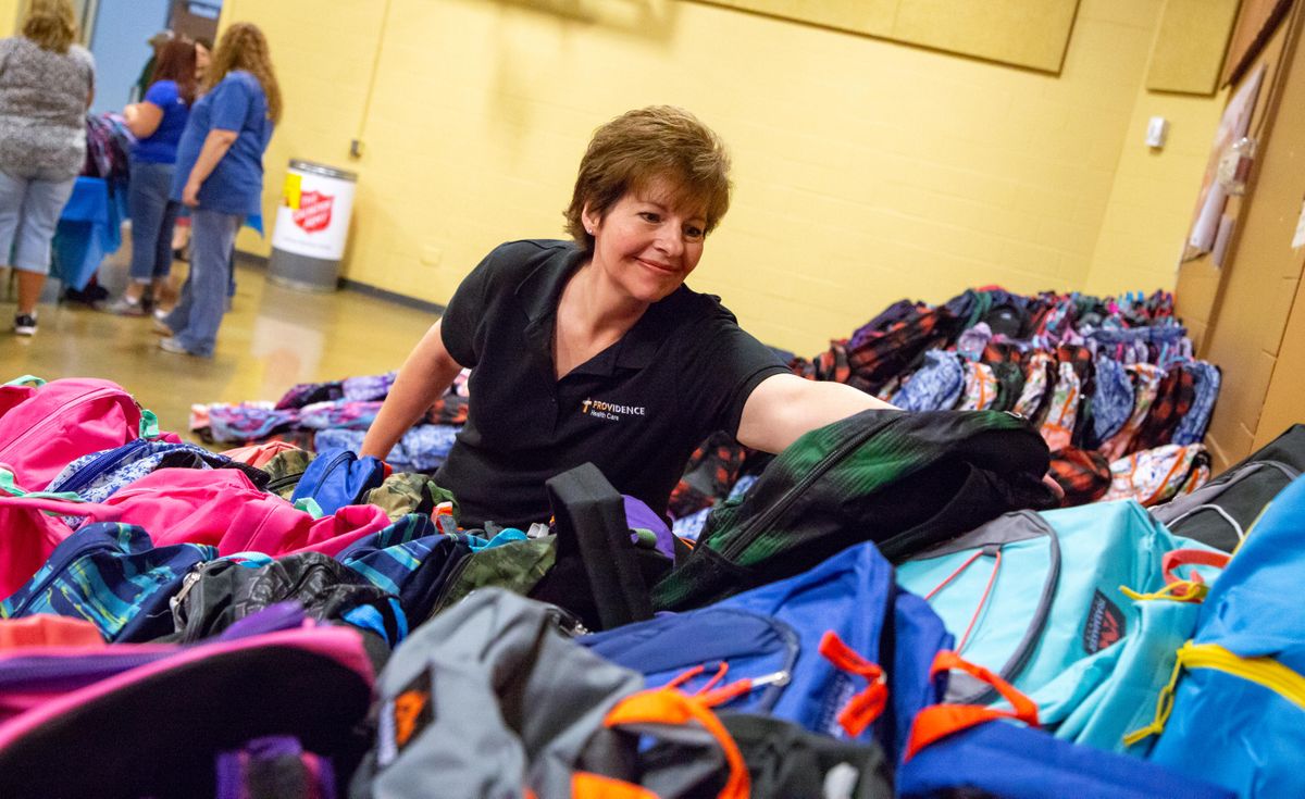 Salvation Army backpack distribution Aug. 15, 2018 The SpokesmanReview
