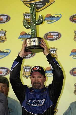 Greg Pursley with the winning trophy at Phoenix. (Photo Credit: Getty Images for NASCAR) (Christian Petersen / Getty Images North America)