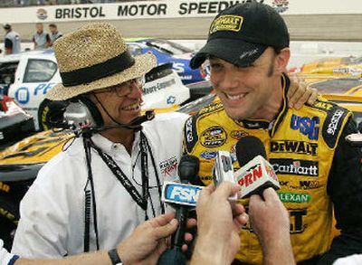 
Car owner Jack Roush, left, congratulates Matt Kenseth on Friday after he won the pole for tonight's NASCAR Sharpie 500.  
 (Associated Press / The Spokesman-Review)