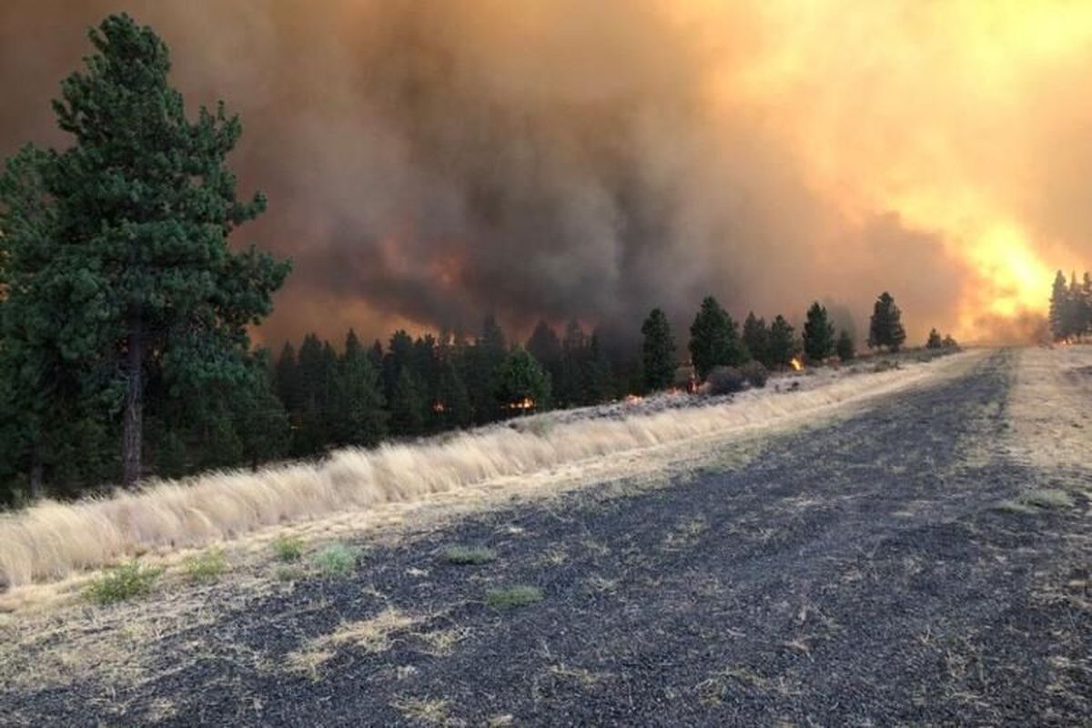 Smoke from the Evans Canyon fire burning at 5,000 acres north of Yakima has shifted east, blanketing Spokane in lower air quality.  (KHQ)