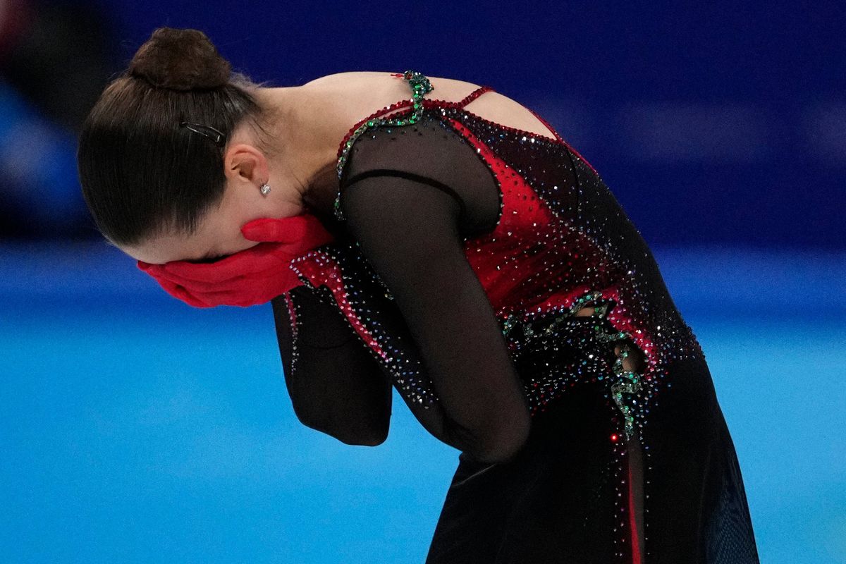 Kamila Valieva, of the Russian Olympic Committee, reacts after the women’s free skate program during the figure skating competition at the 2022 Winter Olympics on Thursday in Beijing. (Bernat Armangue)