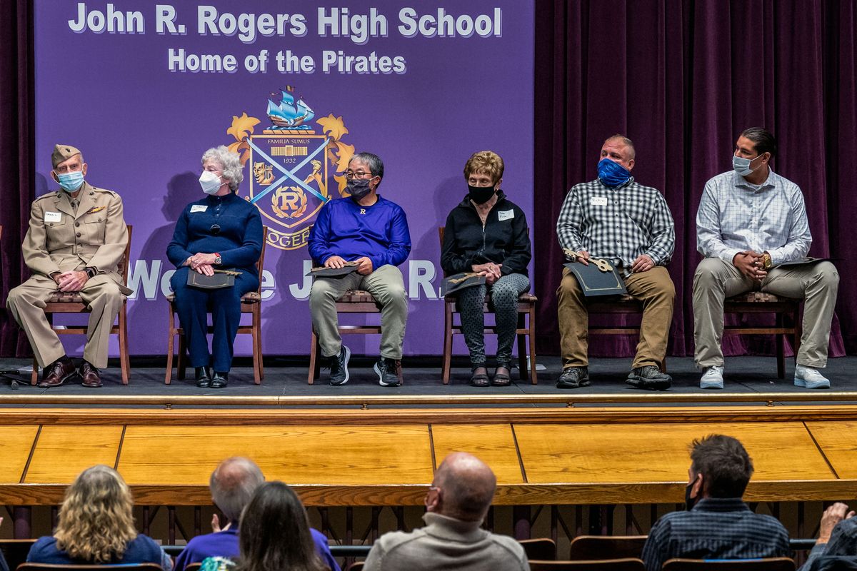 Rogers High honored six graduates in an induction into the school’s Walk of Fame on Friday, Oct. 1, 2021. The alums, from left, are: Dean Ladd (class of 1939), JoAnn Simms (1959) and Rod Tamura (1978), were slated to be inducted into the Walk of Fame as part of Rogers’ 2020 homecoming festivities. However, last year’s homecoming was a casualty of the pandemic. They joined this year’s new inductees – Julie Fish (1958), Rick Welliver (1991) and Levi Horn (2005) – in being inducted as part of the 2021 Rogers homecoming festivities.  (Colin Mulvany/THE SPOKESMAN-REVI)