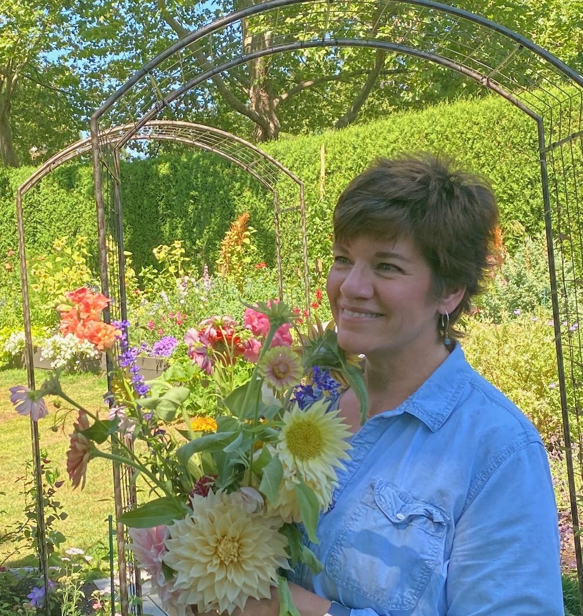 Loreen McFaul of south Spokane holds a bouquet of flowers from her garden.  (Courtesy of Loreen McFaul)