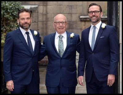 Rupert Murdoch arrives flanked by his sons Lachlan, left, and James for Rupert Murdoch and Jerry Hall's wedding March 5, 2016, in London. (Andrew Parsons/Parsons Media/Zuma Press/TNS)  (Andrew Parsons/Parsons Media/Zuma Press/TNS)