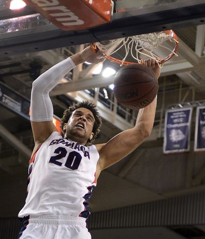 Elias Harris slam down two of his 12 points for the Bulldogs. (Colin Mulvany)