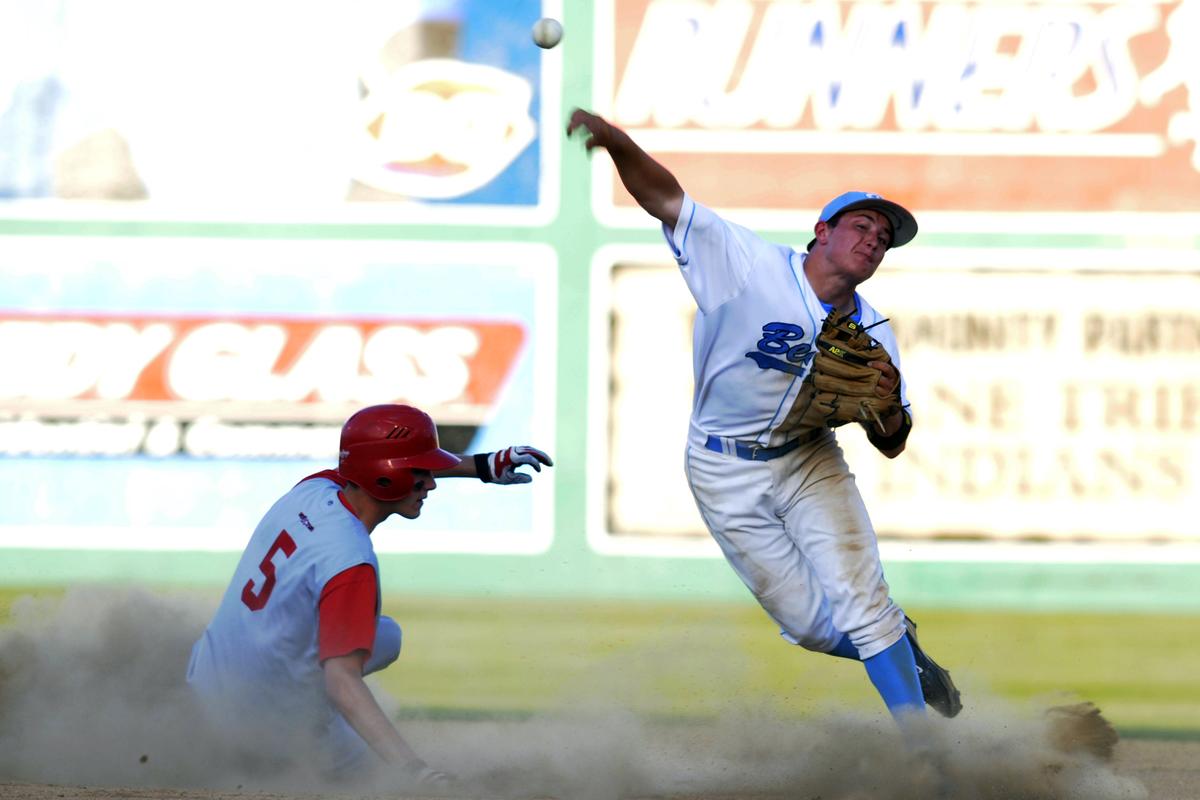 CV shortstop Dane Berg makes the out at second base, forcing Keller Ewing of Ferris, but the throw to first was not in time for the double play. jesset@spokemsan.com (JESSE TINSLEY jesset@spokemsan.com)