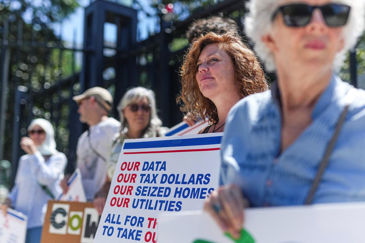 People take part in a nationwide protest against data centers on Sunday in Atlanta.  (Reuters)