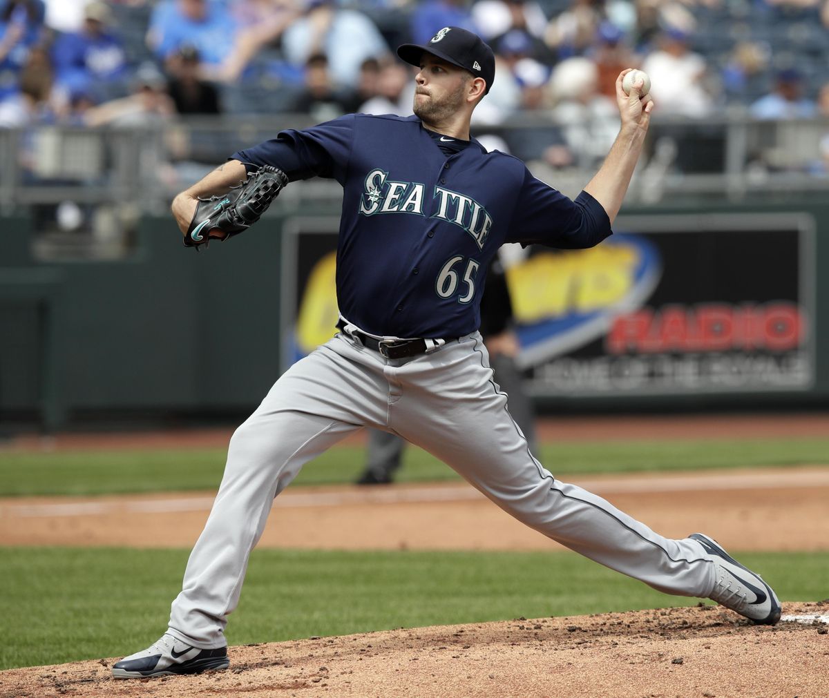 Seattle Mariners starting pitcher James Paxton delivers to a Kansas City  batter during the first inning Wednesday  at Kauffman Stadium in Kansas City, Missouri. (Orlin Wagner / AP)