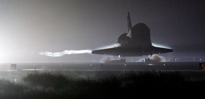The space shuttle Atlantis lands at the Kennedy Space Center  in 2006 after a 12-day mission.  (FileAssociated Press / The Spokesman-Review)