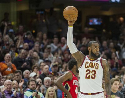 Cleveland Cavaliers' LeBron James celebrates during the first half of an NBA basketball game against the New Orleans Pelicans in Cleveland, Friday, March 30, 2018. (Phil Long / Associated Press)
