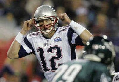
Patriots QB Tom Brady calls a play at the line of scrimmage in the second quarter. 
 (Associated Press / The Spokesman-Review)