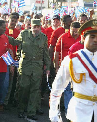 
Cuban President Fidel Castro leads marchers during a demonstration Friday, in Havana, Cuba. Cuban President Fidel Castro leads marchers during a demonstration Friday, in Havana, Cuba. 
 (Associated PressAssociated Press / The Spokesman-Review)