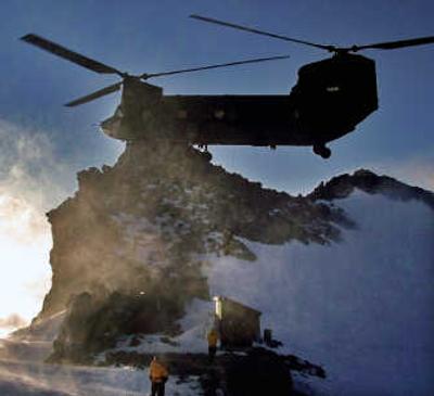 
An Army Reserve helicopter carries hiker Mariana Burceag off Mount Rainier on Wednesday. Associated Press
 (Associated Press / The Spokesman-Review)