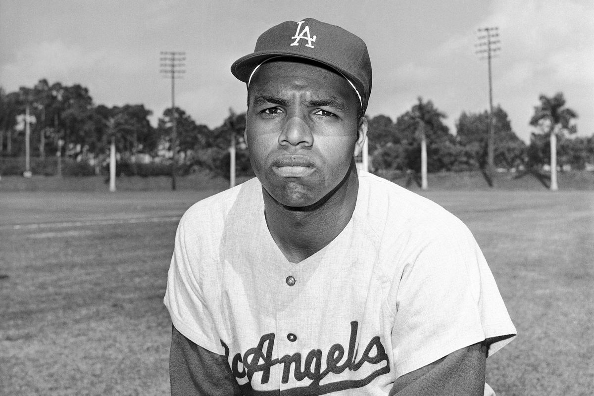 Tommy Davis, outfielder of the Los Angeles Dodgers, is shown March 18, 1964. Davis, a two-time National League batting champion who won three World Series titles with the Los Angeles Dodgers, died Sunday night, April 3, 2022, in Phoenix, the Dodgers announced Monday. He was 83.  (Associated Press)
