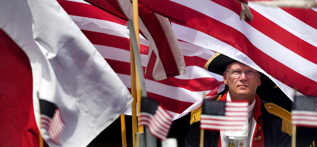 Spokane Flag Museum founder Stan Wills poses for a photograph on Tuesday, June 12, 2018. (Kathy Plonka / The Spokesman-Review)